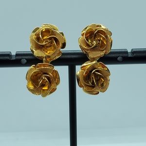 Gold tone double rose clip on earrings